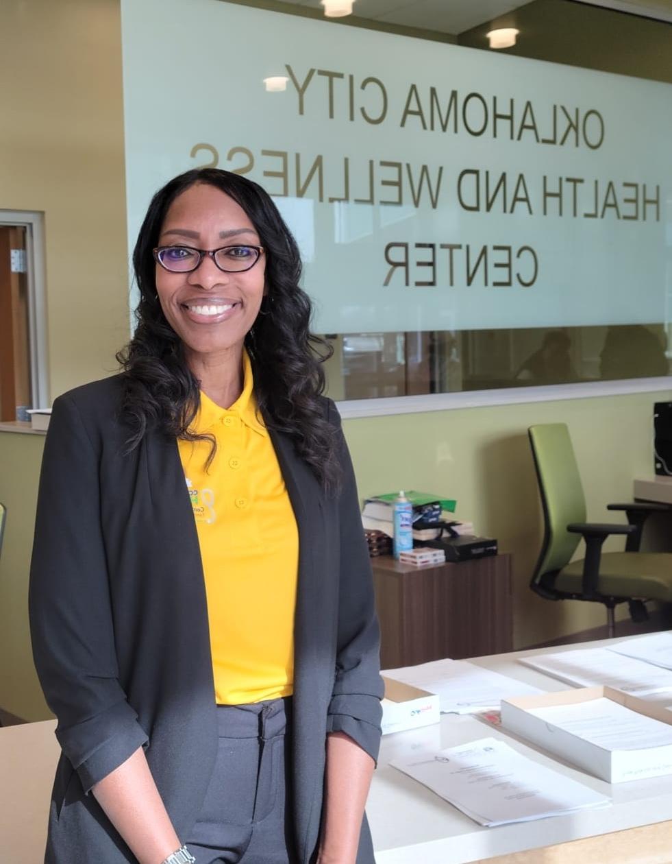 Keisha Williams standing in front of the Oklahoma City Health and Wellness Center